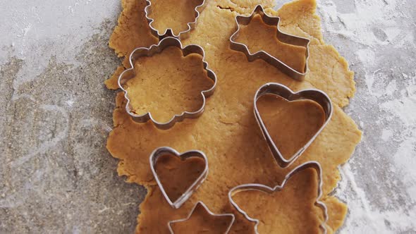 Gingerbread dough with flour and cookie cutter 4k alt