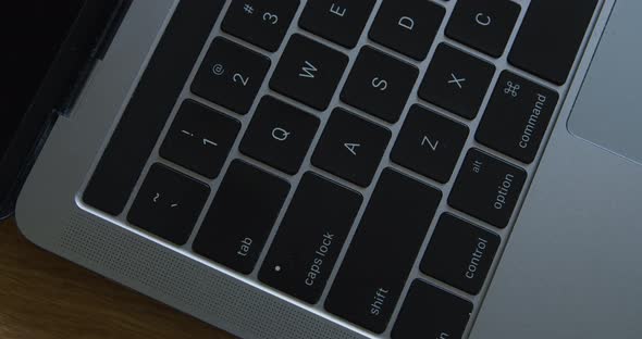 Fly Over Gray Modern Laptop Keyboard Close-up 