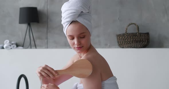 Attractive Confident Serene Woman with Eyes Closed in Pleasure Wrapped in a White Bath Terry Towel alt