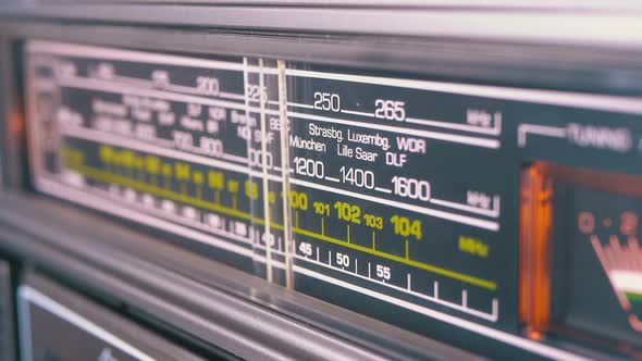 Tuning Analog Radio Dial Frequency on Scale of the Vintage Receiver alt
