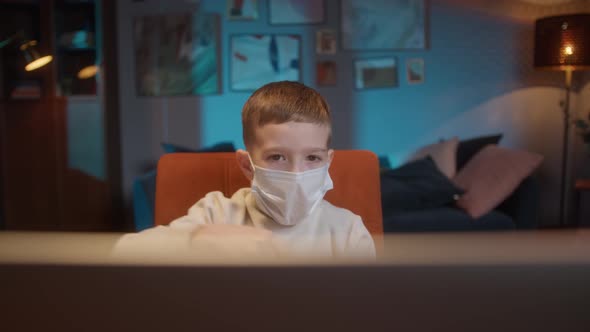 Students Return to School After COVID 19 Coronavirus Lockdown Kid Wearing a Mask Doing Homework on alt