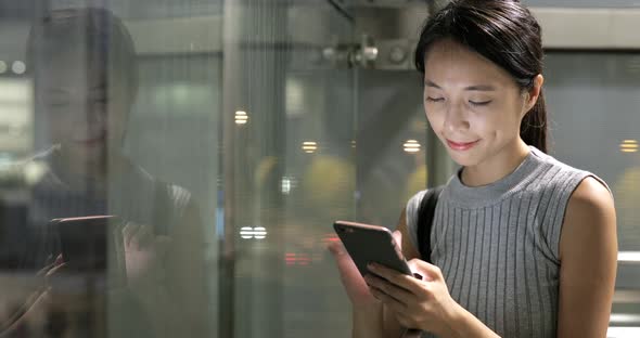 Business Woman Use of Mobile Phone in City  alt