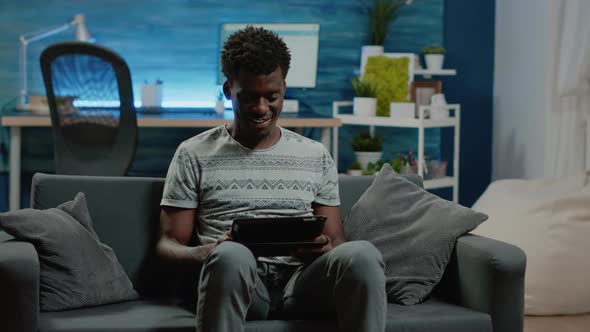 Person Holding Digital Tablet with Touch Screen for Remote Work alt