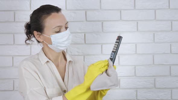 Woman clean devices. alt