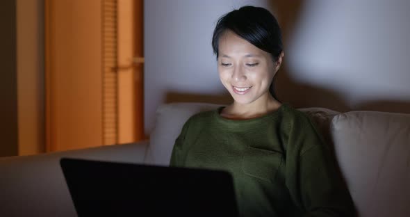 Woman work on computer at home alt