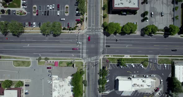 Aerial Overhead View Directly Above Cars on Intersection of City Streets alt