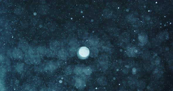 Bubbles Swirling In Water Against Blue Background alt