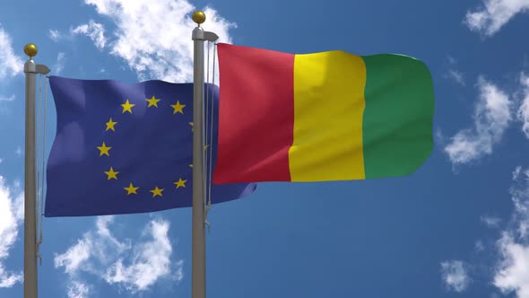 European Union Flag Vs Guinea Flag On Flagpole alt