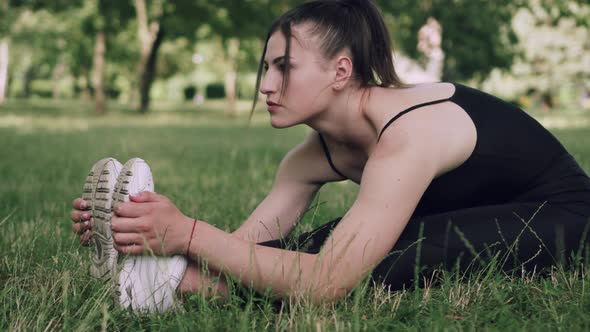 The Woman is Doing Stretching alt