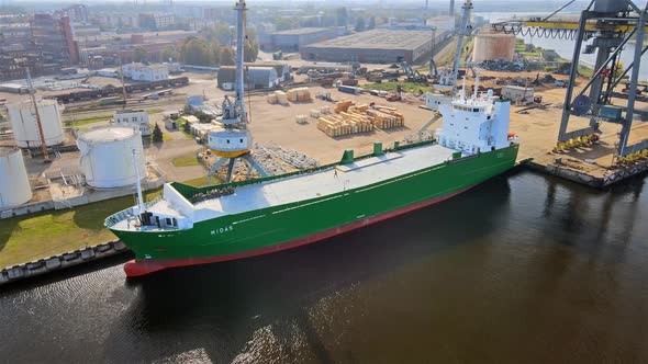 Cargo ship in port alt