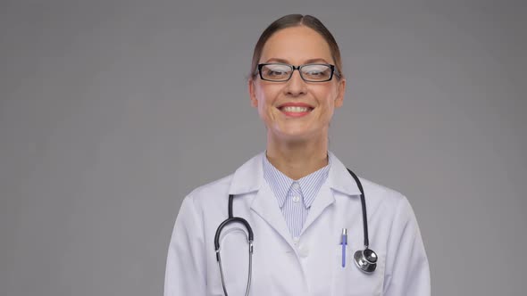 Happy Smiling Female Doctor in Glasses alt