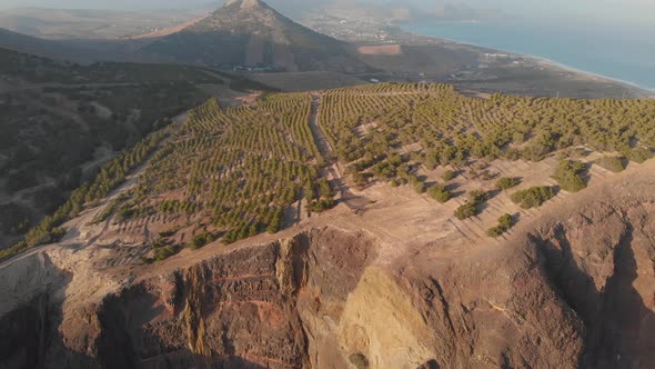 Aerial ascending shot epic landscape crop mountain fields, Porto Santo island alt