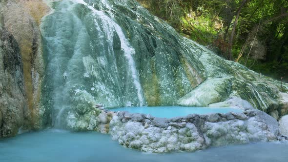 Geothermal pool and hot spring in Tuscany, Italy. Bagni San Filippo natural thermal waterfall in the alt