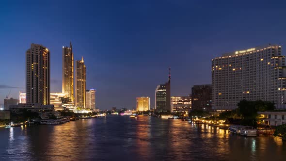 Bangkok city center financial business district, waterfront cityscape and Chao Phraya River.