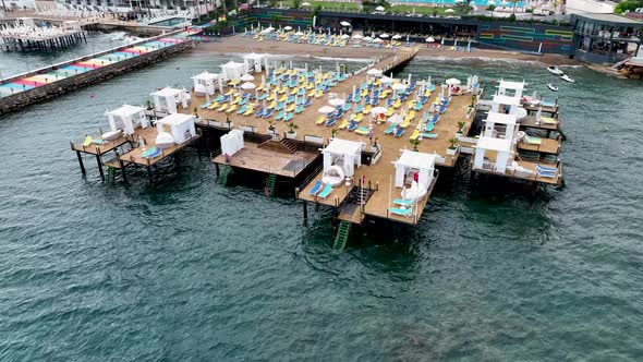 Beach Infrastructure of hotels aerıal vıew Turkey Alanya 4K alt