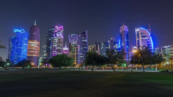 The Skyline of Doha By Night with Starry Sky Seen From Park Timelapse Hyperlapse Qatar alt