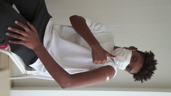 Vertical Video of Young African American Teenager Portrait Middle Shot alt