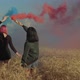Females Enjoying Outdoor Leisure with Smoke Bombs - VideoHive Item for Sale