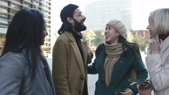 Diverse Group of Business People Relaxing Together Outdoors alt