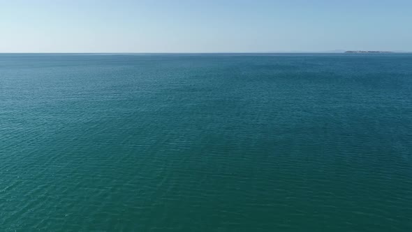 video flight over ocean, sea. Close to the water alt