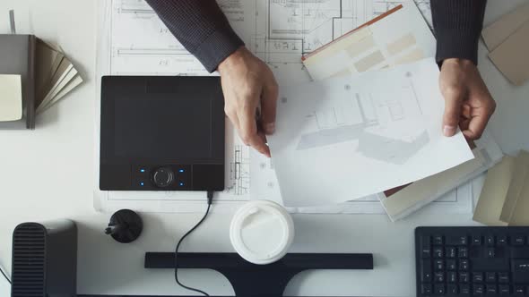 Architect Design and Color Swatches and Light Pen on a Desk alt