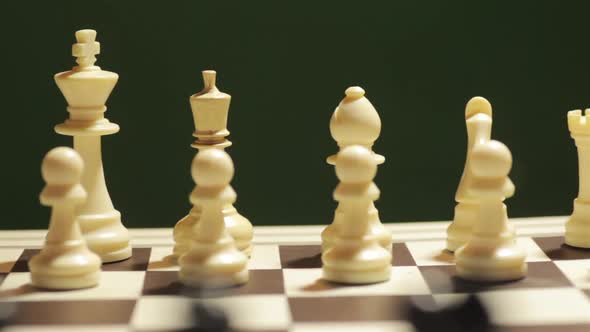 Chess board, with white pieces in focus