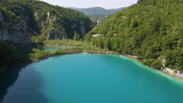 View of the beautiful Plitvice Lakes National Park with many green plants and beautiful lakes and th alt