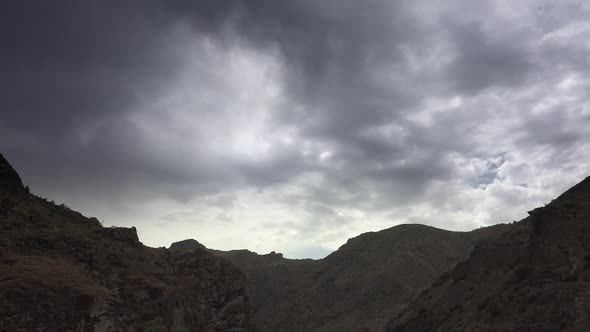 Air Currents of Clouds on Rocky Narrow Passage alt
