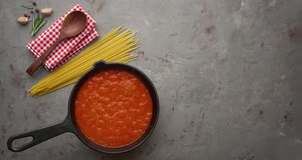 Cinemagraph loop. Bubbling hot tomato sauce for pasta, cooking in pan.