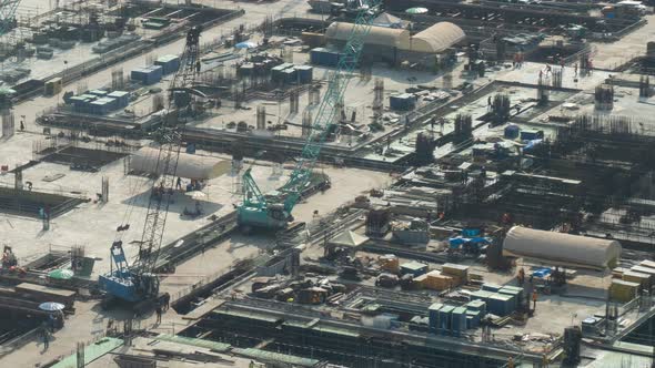Time Lapse of Construction Site with Heavy Construction Machinery in Metropolis alt