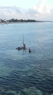 Boat Boats in the Ocean Near the Coast of Zanzibar Tanzania Slow Motion Vertical Video alt