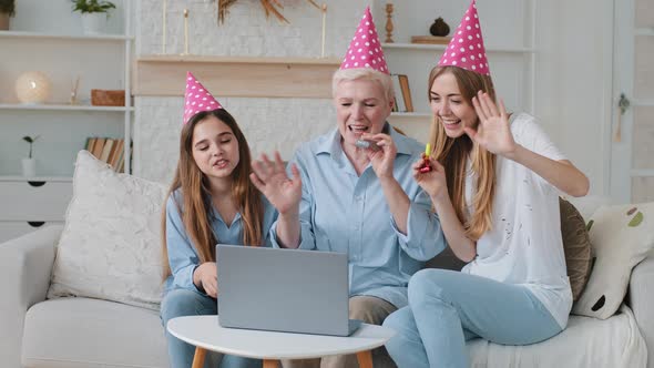 Smiling Young Adult Mother Cute Adorable Child Granddaughter and Older Mature Grandmother in Funny alt