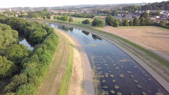 Aerial drone footage of a flood prevention system in Exeter, England. alt