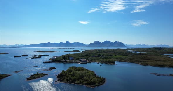 Fly over idyllic islands on a nice sunny summer day, Northern Norway, Northern Scandinavia, idyllic alt