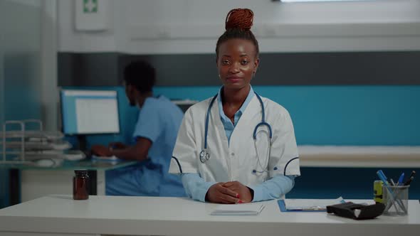 Young Doctor Using Video Call Conference for Telemedicine alt