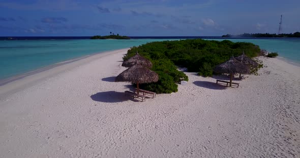 Beautiful above travel shot of a sunshine white sandy paradise beach and aqua blue water background  alt