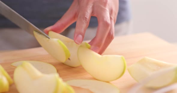 cutting an apple alt