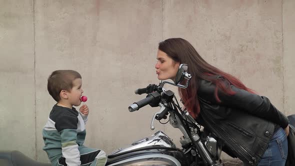 Mom wants to kiss her son alt