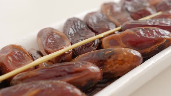 Phoenix dactylifera exotic fruit in the package slow panning 4K 2160p UltraHD footage - Date palm fr alt