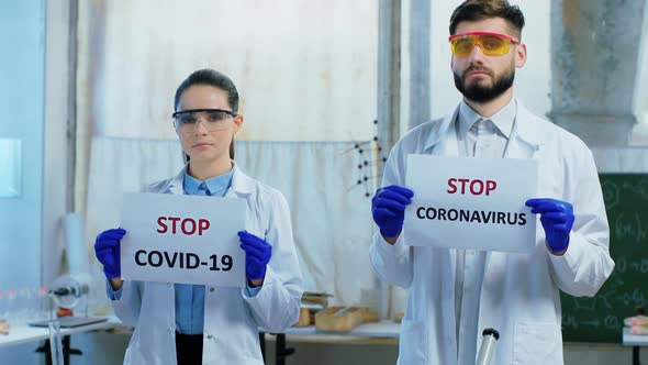 Attractive Woman and Man Scientist in the alt