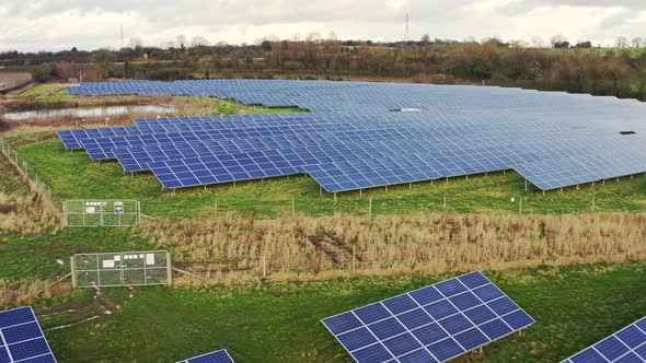 A solar farm in Staffordshire, thousands of Solar Panels capturing the sun's natural light and conve alt