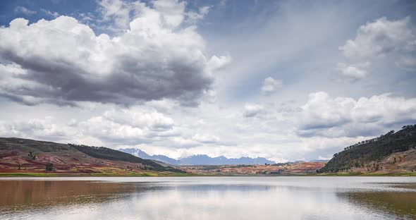 Timelapse of Peru landscape at a lake near Cusco in the Andes Mountains Range. Time lapse of clouds 
