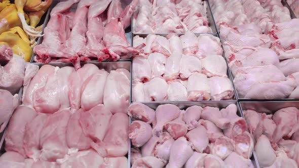 Chicken and Pork on the Market Counter alt