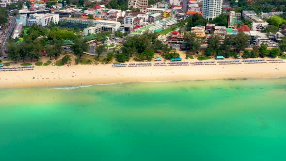 Flying along Karon Beach and the tourist area on the island of Phuket in Thailand, the Indian Ocean alt