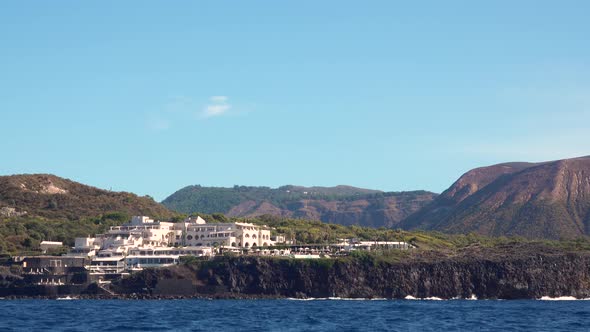 View on Steep Rocky Mountains with Big White Hotel Complex alt