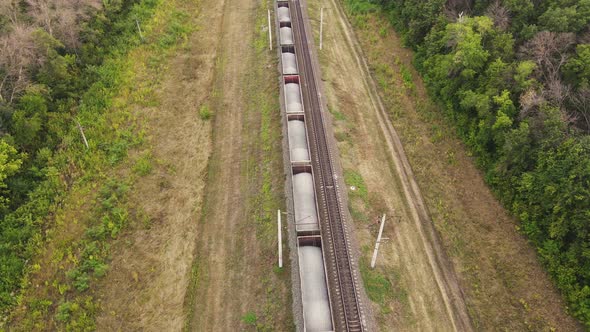 Freight Train or Railway Wagon Rides on Railroad alt