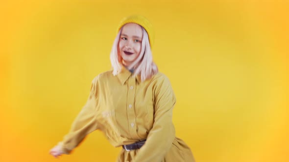 Beautiful Woman with Pink Hair and Piercing Dancing Meme Dance on Yellow alt