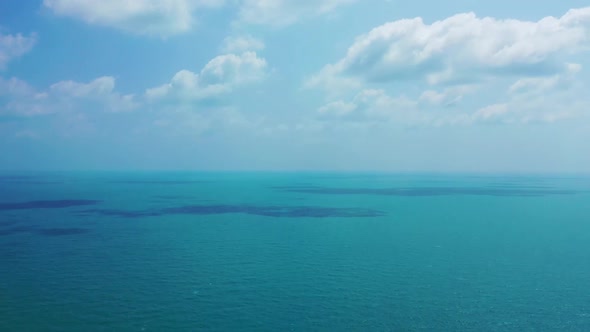 Aerial seascape of exotic coastline beach trip by blue ocean and white sand background of a picnic a alt