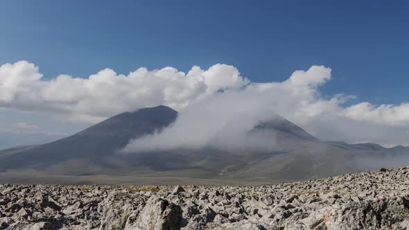 Time-lapse shot of moving white clouds at Abuli Mountain. Georgia alt