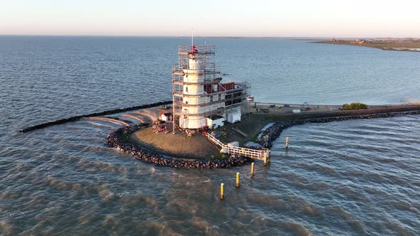 Aerial View of the Paard Van Marken at Sunrise Traditional Historic Monument Lighthouse on the alt